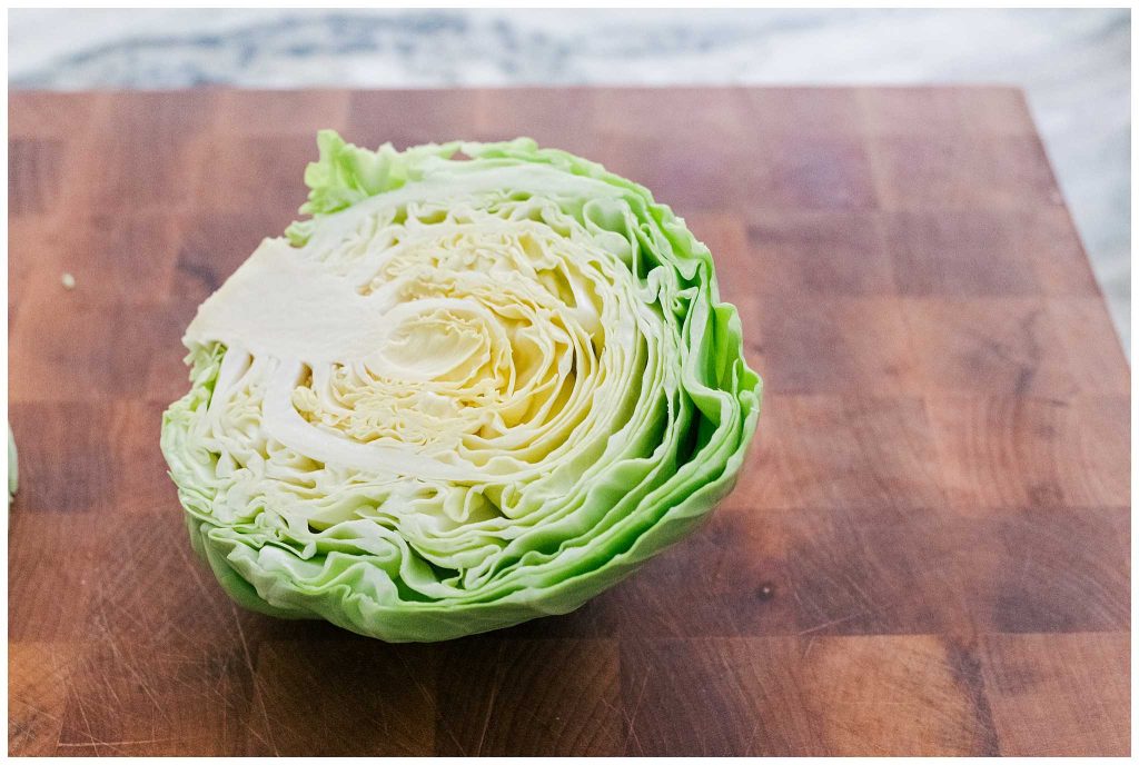 Half of a cabbage that is going to be made into sauerkraut 