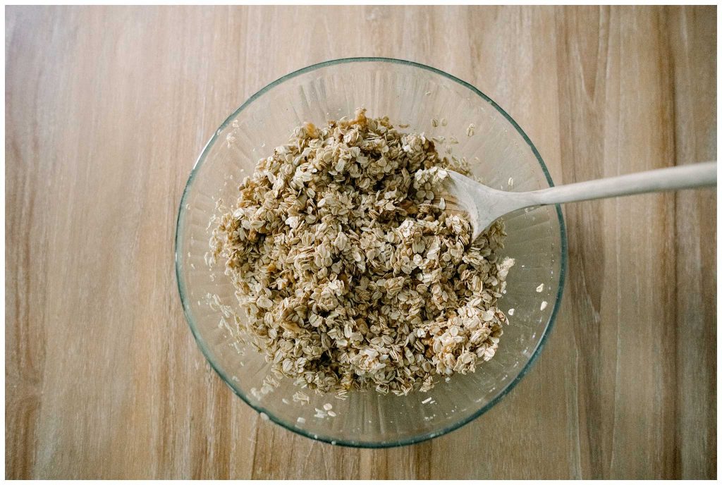 homemade granola mixed up in a bowl before baking