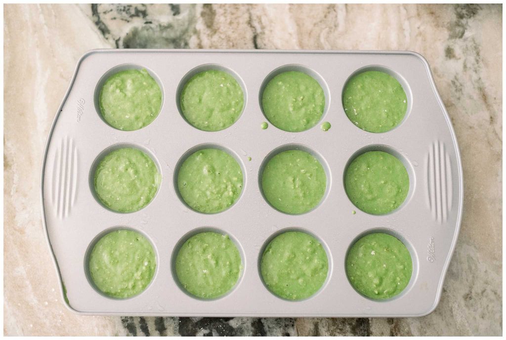 Sourdough Discard Spinach Muffins in muffin tin unbaked