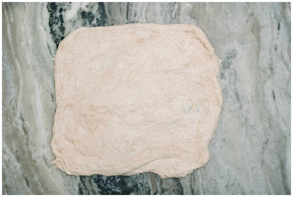 Sourdough bread flattened out before adding sourdough inclusions