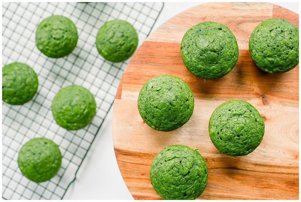 Sourdough Spinach Muffins Using Sourdough Discard Being transferred from cooling rack to platter