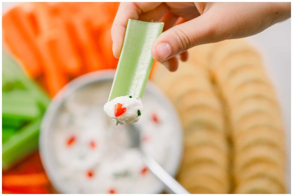 Celery dipped in Easy Veggie Dip